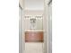 Well-lit bathroom featuring double vanity, and a shower with glass door at 5236 Clover Mist Dr, Apollo Beach, FL 33572