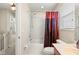Bathroom featuring a bathtub with shower, toilet, and vanity with storage at 5236 Clover Mist Dr, Apollo Beach, FL 33572