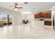 Spacious kitchen with stainless steel appliances, wooden cabinets, and an eat-in dining area at 5236 Clover Mist Dr, Apollo Beach, FL 33572