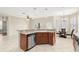 Open concept kitchen with stainless steel dishwasher and pendant lighting at 5236 Clover Mist Dr, Apollo Beach, FL 33572