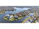 Waterfront property featuring a private boat dock, scenic views, and luxurious coastal living at 5326 Loon Nest Ct, Apollo Beach, FL 33572
