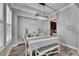 Bright dining room boasts wood-look floors, decorative lighting, and neutral decor at 5326 Loon Nest Ct, Apollo Beach, FL 33572