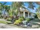 Beautiful home exterior with lush landscaping and a well-manicured lawn at 5326 Loon Nest Ct, Apollo Beach, FL 33572