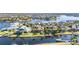 Waterfront home boasting a private dock for boating and easy access to waterfront enjoyment at 5326 Loon Nest Ct, Apollo Beach, FL 33572