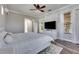 Comfortable main bedroom with ceiling fan, modern furnishings, and neutral decor at 5326 Loon Nest Ct, Apollo Beach, FL 33572