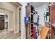 Spacious walk-in closet with custom shelving and ample storage for clothes and accessories at 5326 Loon Nest Ct, Apollo Beach, FL 33572