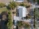 Aerial view of the property showcasing the home's layout, landscaping, and surrounding area at 6131 Central Ave, New Port Richey, FL 34653