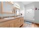 Bright bathroom featuring double sinks, a soaking tub, and stylish fixtures at 6131 Central Ave, New Port Richey, FL 34653