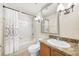 Bathroom featuring bath tub, shower and granite vanity countertop with sink at 6262 Maisie Rd, Zephyrhills, FL 33542