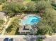 A relaxing pool area awaits with lounge chairs and clear blue water, perfect for community enjoyment at 6262 Maisie Rd, Zephyrhills, FL 33542