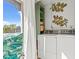 Laundry room with stacked washer and dryer at 716 Cordova Grn, Seminole, FL 33777