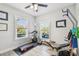 Bright exercise room with natural light and a ceiling fan at 7403 S Obrien St, Tampa, FL 33616