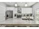 Beautiful kitchen with a spacious granite island, stainless steel appliances, and modern fixtures at 7403 S Obrien St, Tampa, FL 33616