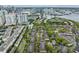 Community aerial with mature landscaping, community tennis, and convenient parking at 846 Normandy Trace Rd, Tampa, FL 33602
