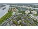 Aerial view of a waterfront community with a mix of townhomes and condos at 846 Normandy Trace Rd, Tampa, FL 33602