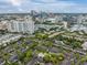 Overhead view of a community featuring city skyline and multiple recreational amenities at 846 Normandy Trace Rd, Tampa, FL 33602