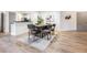 Open dining area with modern table, chairs, and stylish decor at 846 Normandy Trace Rd, Tampa, FL 33602