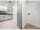 A laundry room with washer hookups and wire shelving for storage at 846 Normandy Trace Rd, Tampa, FL 33602