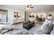 Open-concept living space featuring modern decor and an adjacent dining area at 846 Normandy Trace Rd, Tampa, FL 33602
