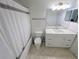 Clean, renovated bathroom featuring tile floors, a shower-tub combination, and a new vanity at 8517 Sea Harbour Ln # 103, Temple Terrace, FL 33637