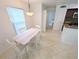 Cozy dining area adjacent to kitchen, offering a bright and inviting space at 8517 Sea Harbour Ln # 103, Temple Terrace, FL 33637