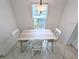 Comfortable dining area featuring a modern table and chairs, perfect for Gathering meals or entertaining guests at 8517 Sea Harbour Ln # 103, Temple Terrace, FL 33637