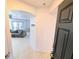 Entryway into living space featuring tile flooring and an open archway at 8517 Sea Harbour Ln # 103, Temple Terrace, FL 33637