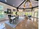 Bright living room with large windows, fireplace, and comfortable seating at 8517 Sea Harbour Ln # 103, Temple Terrace, FL 33637