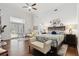 Inviting main bedroom offers a sitting area, private patio access, and lots of natural light, ideal for relaxation at 9606 Braden Run, Bradenton, FL 34202