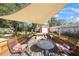Inviting backyard with a patio, fire pit, comfortable seating, and well-manicured landscaping at 10373 54Th N Ave, St Petersburg, FL 33708