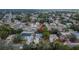 Aerial view of neighborhood highlighting this single story home with mature trees and fenced in yard at 11283 Portsmouth St, Spring Hill, FL 34609