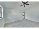 Bright bedroom featuring plank flooring and direct access to the pool area at 11283 Portsmouth St, Spring Hill, FL 34609