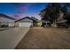 Charming single-story home with a well-manicured lawn and an attached two-car garage at 11283 Portsmouth St, Spring Hill, FL 34609