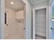 Hallway leading to the pantry, laundry room, and exterior at 11283 Portsmouth St, Spring Hill, FL 34609