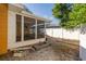 Backyard with brick paved patio, screened enclosure, and landscaping, perfect for outdoor living at 11351 130Th Ave, Largo, FL 33778