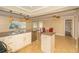 Spacious kitchen with granite countertops, stainless steel dishwasher, and tile floors at 11351 130Th Ave, Largo, FL 33778