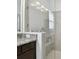 Close up of shower with glass door and granite countertop at 11912 Richmond Trl, Parrish, FL 34219