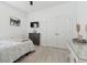 Bedroom with a bed, dresser, and a window with natural light at 11912 Richmond Trl, Parrish, FL 34219