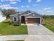 Beautiful single-story home with a well-maintained lawn and inviting curb appeal at 11912 Richmond Trl, Parrish, FL 34219
