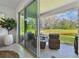 Outdoor patio with water view and comfortable seating at 11912 Richmond Trl, Parrish, FL 34219