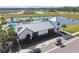 Community clubhouse featuring a pool, sun deck, and well-manicured landscaping, perfect for relaxation at 11912 Richmond Trl, Parrish, FL 34219