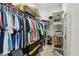 Spacious walk-in closet with shelving, rods and containers at 11912 Richmond Trl, Parrish, FL 34219