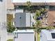 Top-down aerial of property showcasing roof, landscaping and close proximity to neighborhood at 120 148Th E Ave, Madeira Beach, FL 33708