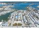 Stunning aerial view of waterfront property showcasing access to the bay and local beaches at 120 148Th E Ave, Madeira Beach, FL 33708