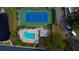 The aerial view highlights the lovely pool and tennis court at 14511 Catalina Cir # 14511, Seminole, FL 33776