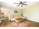 Comfortable living room featuring stylish sofa, rustic coffee table and adjacent dining area for relaxed living and entertaining at 14511 Catalina Cir # 14511, Seminole, FL 33776