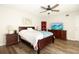Comfortable main bedroom with spacious layout, wood floors and ample natural light, offering a relaxing retreat at 14511 Catalina Cir # 14511, Seminole, FL 33776