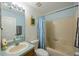 Standard bathroom features a shower-tub combo and a single sink vanity at 15429 Green Jay Rd, Weeki Wachee, FL 34614