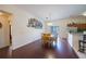 Bright dining room with hardwood floors and view of backyard pool at 15429 Green Jay Rd, Weeki Wachee, FL 34614