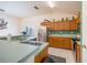 Kitchen featuring stainless steel appliances and tile backsplash at 15429 Green Jay Rd, Weeki Wachee, FL 34614